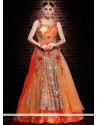 Capricious Net Orange And Peach Floor Length Gown