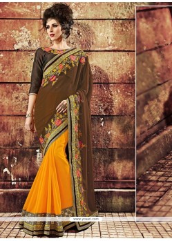 Lustrous Georgette Yellow And Brown Embroidered Work Designer Saree