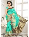 Lovely Sea Green Lace Work Banarasi Silk Designer Saree