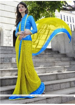 Sonorous Turquoise And Yellow Patch Border Work Georgette Casual Saree