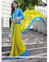 Sonorous Turquoise And Yellow Patch Border Work Georgette Casual Saree