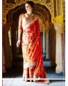 Blooming Net Orange Zari Work Designer Saree