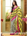 Opulent Off White And Yellow Shaded Georgette Saree
