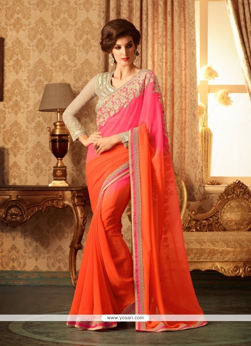 Mesmerizing Orange And Pink Georgette Designer Saree