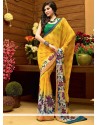 Bedazzling Yellow And Off White Shaded Faux Georgette Printed Saree
