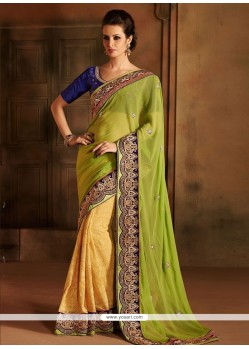 Lustrous Green And Yellow Georgette Designer Saree