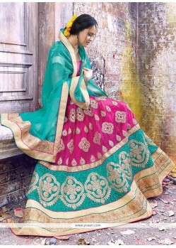 Alluring Net Hot Pink And Turquoise Patch Border Work A Line Lehenga Choli