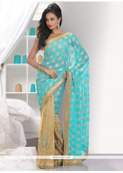 Pristine Turquoise And Beige Shimmer Georgette Saree