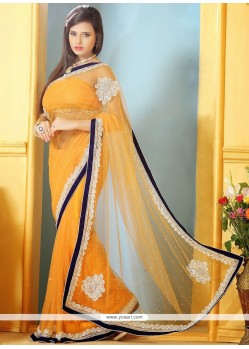 Fascinating Orange Net Designer Saree