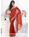 Lustrous Rust Shaded Faux Georgette Saree