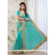 Innovative Turquoise Embroidered Work Net Classic Designer Saree