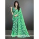 Aristocratic Green Print Work Casual Saree