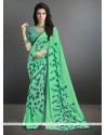 Aristocratic Green Print Work Casual Saree