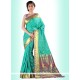 Engrossing Turquoise Print Work Art Silk Casual Saree