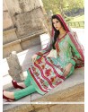 Whimsical Red And Sea Green Embroidered Work Cotton Churidar Designer Suit