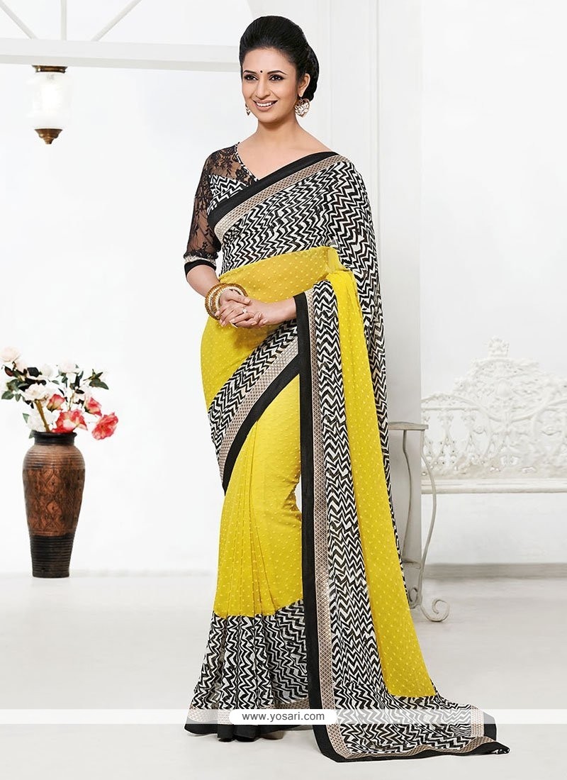 Yellow And Off White Bember Georgette Saree