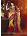 Patch Border Net Designer Saree In Pink And Yellow