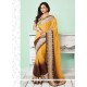 Dignified Brown And Yellow Jute Silk Classic Saree
