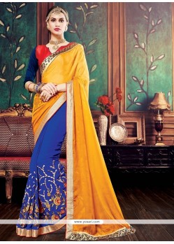 Delectable Embroidered Work Blue And Yellow Georgette Designer Half N Half Saree