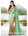 Beige And Sea Green Georgette And Net Saree