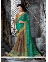 Outstanding Art Silk Brown And Sea Green Embroidered Work Classic Saree