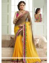 Radiant Brown And Yellow Georgette Saree
