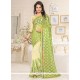 Haute Beige And Green Resham Work Lycra Designer Saree