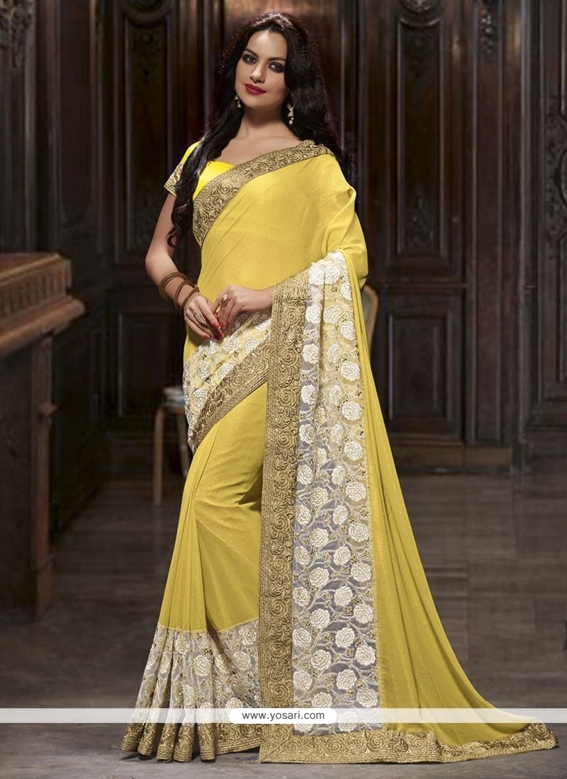 Classy Georgette White And Yellow Patch Border Work Classic Saree