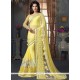Fabulous Tissue Yellow Patch Border Work Classic Designer Saree