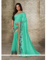 Exotic Sea Green Patch Border Work Casual Saree