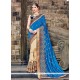Glossy Beige And Blue Embroidered Work Raw Silk Traditional Saree