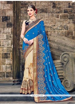 Glossy Beige And Blue Embroidered Work Raw Silk Traditional Saree