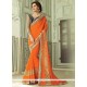 Sonorous Embroidered Work Orange Traditional Saree