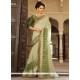 Dilettante Georgette Beige And Green Classic Saree