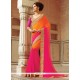 Flattering Georgette Hot Pink And Orange Patch Border Work Classic Designer Saree
