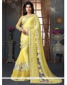 Patch Border Fancy Fabric Designer Saree In Yellow