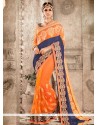 Observable Embroidered Work Orange Traditional Saree