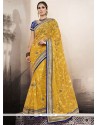 Outstanding Embroidered Work Yellow Georgette Classic Designer Saree