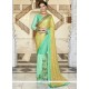 Tiptop Georgette Sea Green And Yellow Designer Half N Half Saree