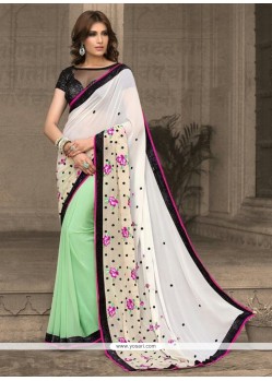 Modish Off White And Sea Green Georgette Traditional Saree