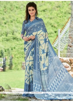 Astounding Blue And Cream Crepe Jacquard Printed Saree