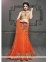 Luxurious Orange Net Lehenga Choli