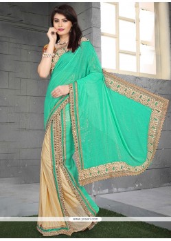 Scintillating Embroidered Work Beige And Sea Green Faux Georgette Classic Saree