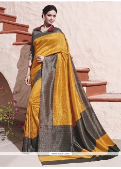 Impeccable Grey And Mustard Traditional Saree