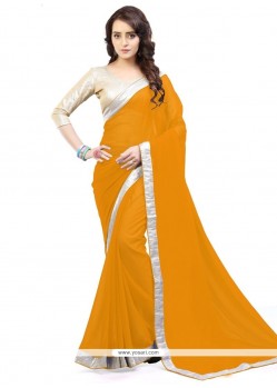 Captivating Mustard Lace Work Faux Georgette Casual Saree
