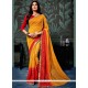 Awesome Faux Chiffon Mustard And Red Lace Work Printed Saree