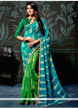 Unique Blue And Green Lace Work Faux Chiffon Printed Saree