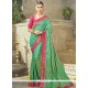 Delightful Art Silk Green Embroidered Work Traditional Saree