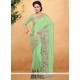 Energetic Sea Green Patch Border Work Classic Saree