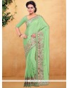 Energetic Sea Green Patch Border Work Classic Saree